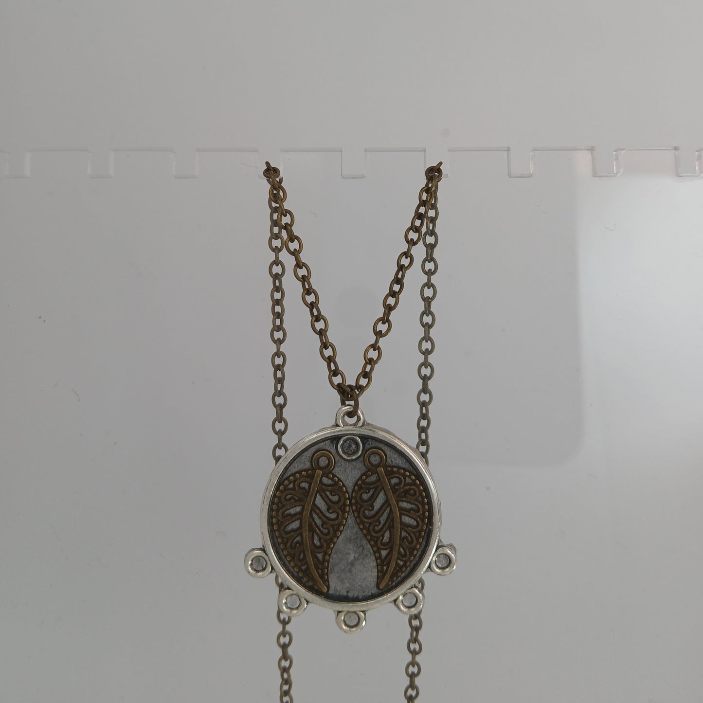 Metal Circle with Antique Brass Leaves Necklace